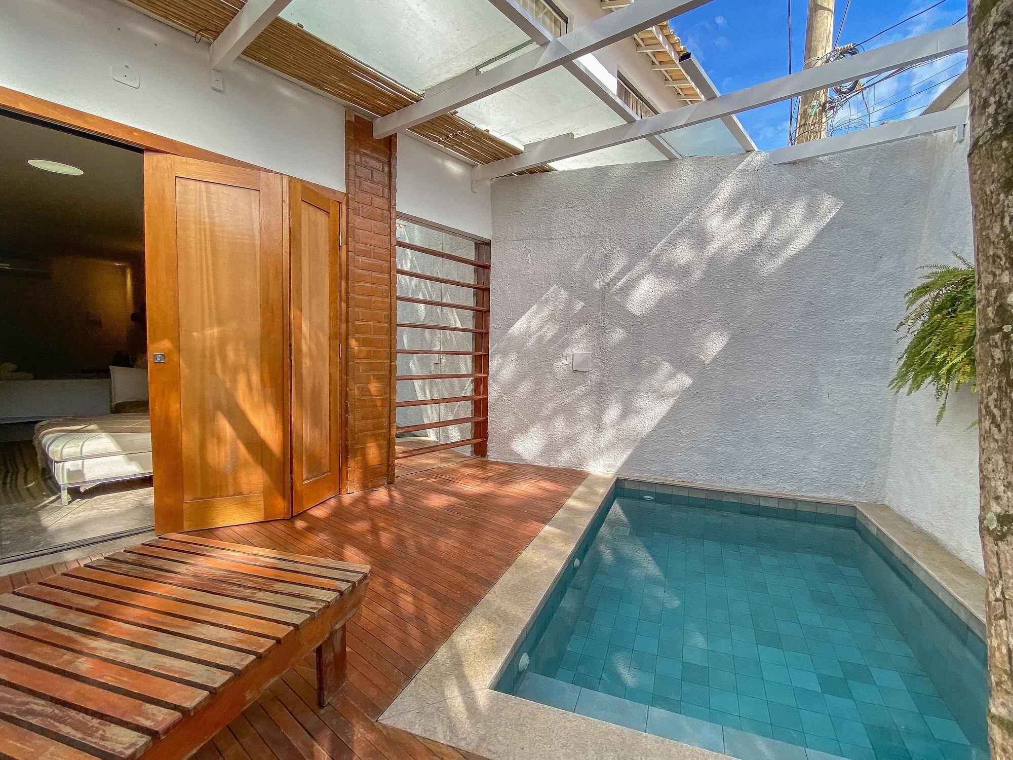 Passagem Concept Hotel e Spa Cabo Frio Esterno foto A private pool at a hotel in Mexico City